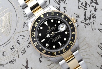 Rolex GMT-Master 16713 Stainless Steel and Yellow Gold Watch with Black Dial Complete