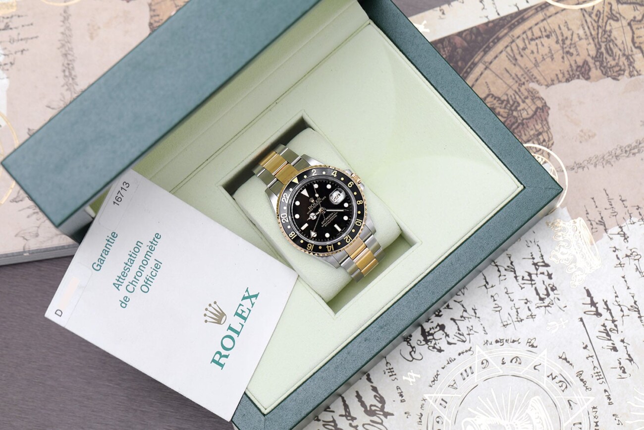 Rolex GMT-Master 16713 Stainless Steel and Yellow Gold Watch with Black Dial Complete