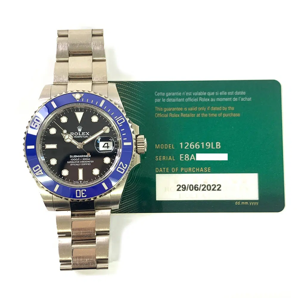 Rolex Submariner 126619LB white gold, blue bezel, black dial, dial detail