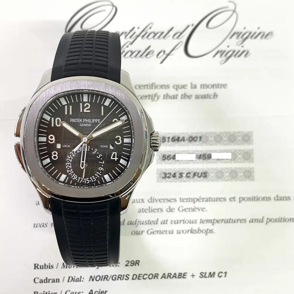 Patek Philippe Aquanaut Travel Time 5164A-001 stainless steel watch, dial detail