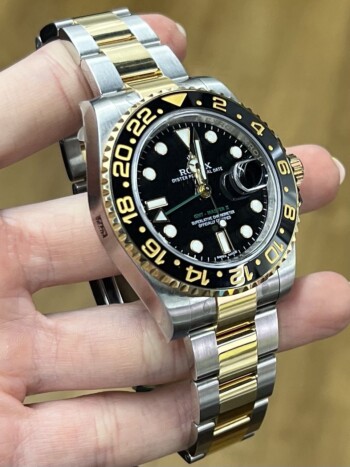 Rolex GMT-Master II 116713LN steel and yellow gold watch, side view