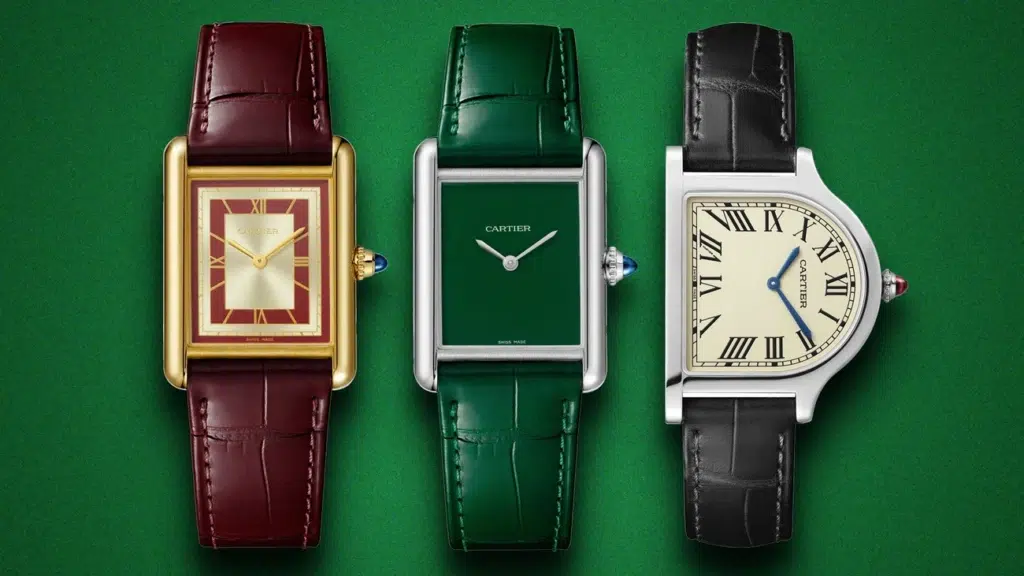 Three elegant Cartier Tank watches