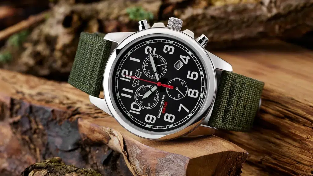 Black dial watch with green strap