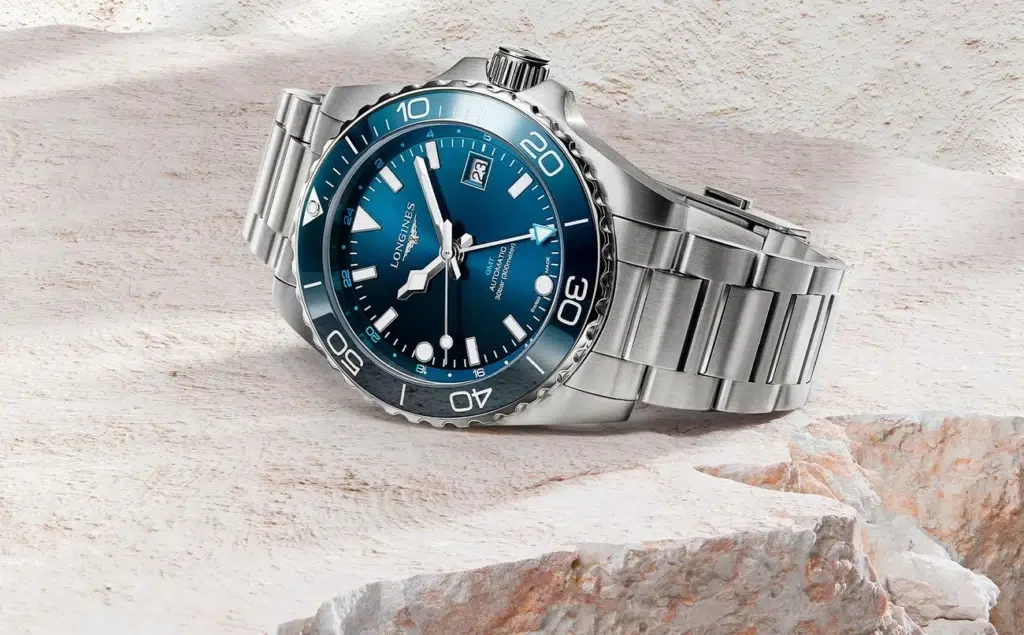 Elegant blue diving watch on rocks