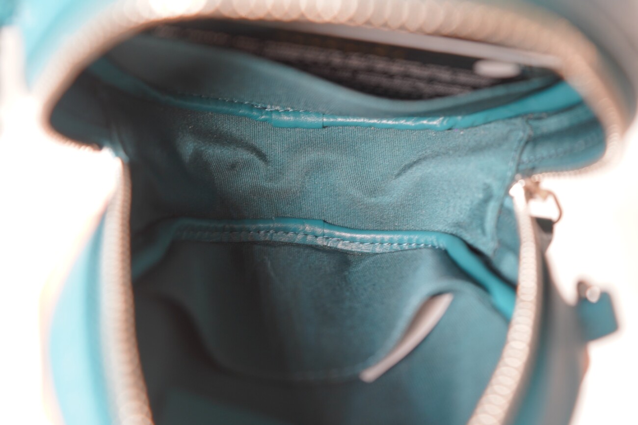 Chanel Quilted Round Clutch