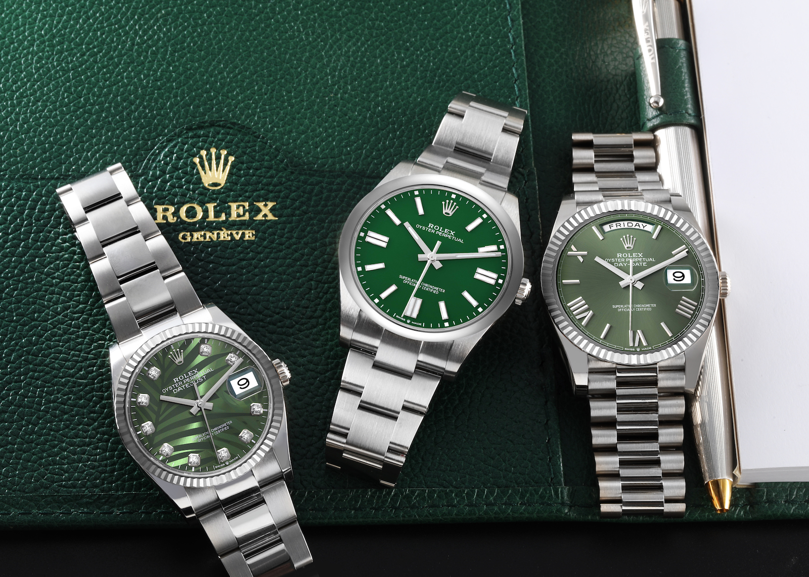 three Rolex watches with green and khaki dials three Rolex watches with green and khaki dials