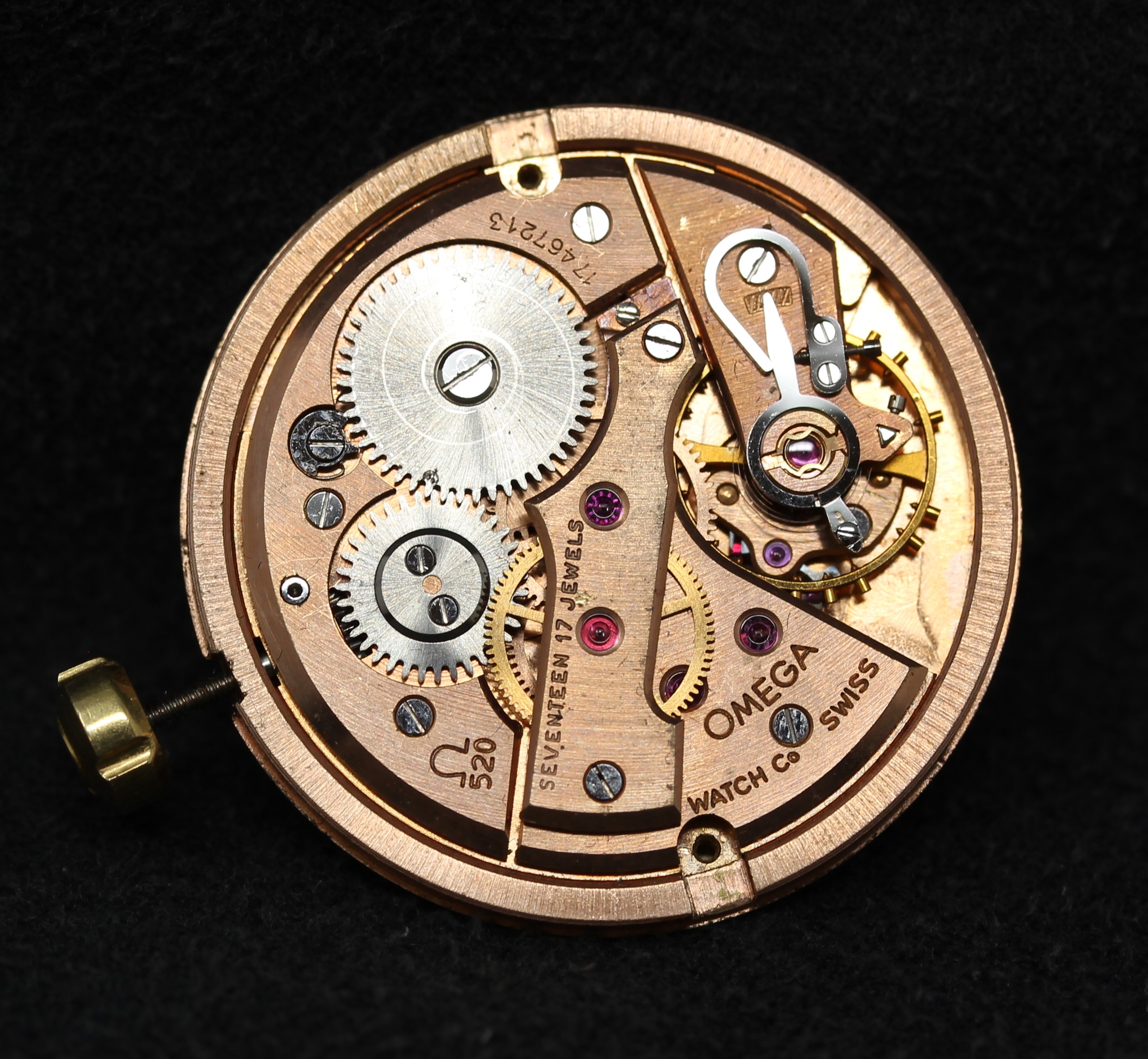 close-up of an omega watch showcasing its mechanical movement