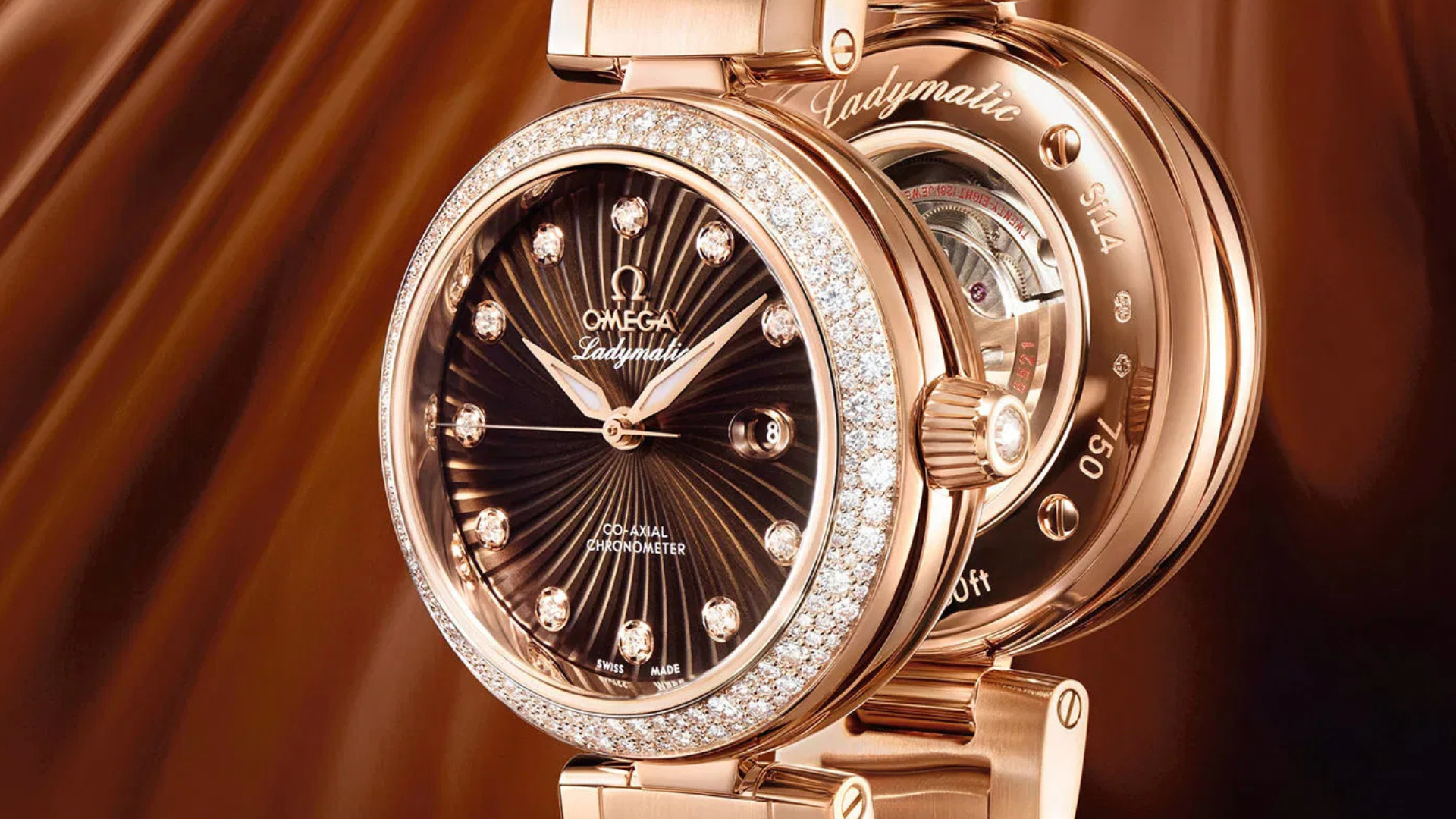 Omega De Ville Ladymatic On a Brown Background Omega De Ville Ladymatic In Gold