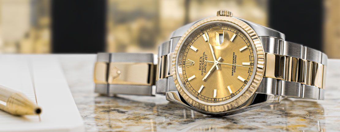 a stylish rolex datejust with a champagne dial
