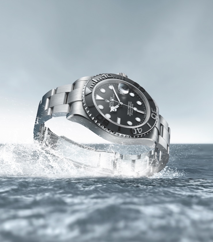 Rolex Yacht-Master displayed on a water-inspired background